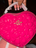 Pink heart coach